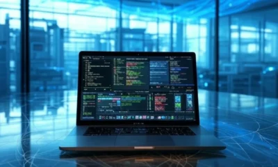 Futuristic view of Apple AI server factory in Texas with M4 MacBook Air displaying triple screens for editing and coding.