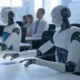 A futuristic office scene featuring AI robots with sleek, metallic designs performing tasks at desks, while a human in a suit observes from the background.