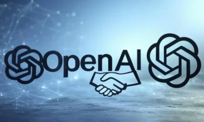 A vibrant neon illustration of a handshake symbolizing the OpenAI and Microsoft partnership renegotiation, with their logos intertwined and a futuristic cityscape in the background, representing AI innovation.